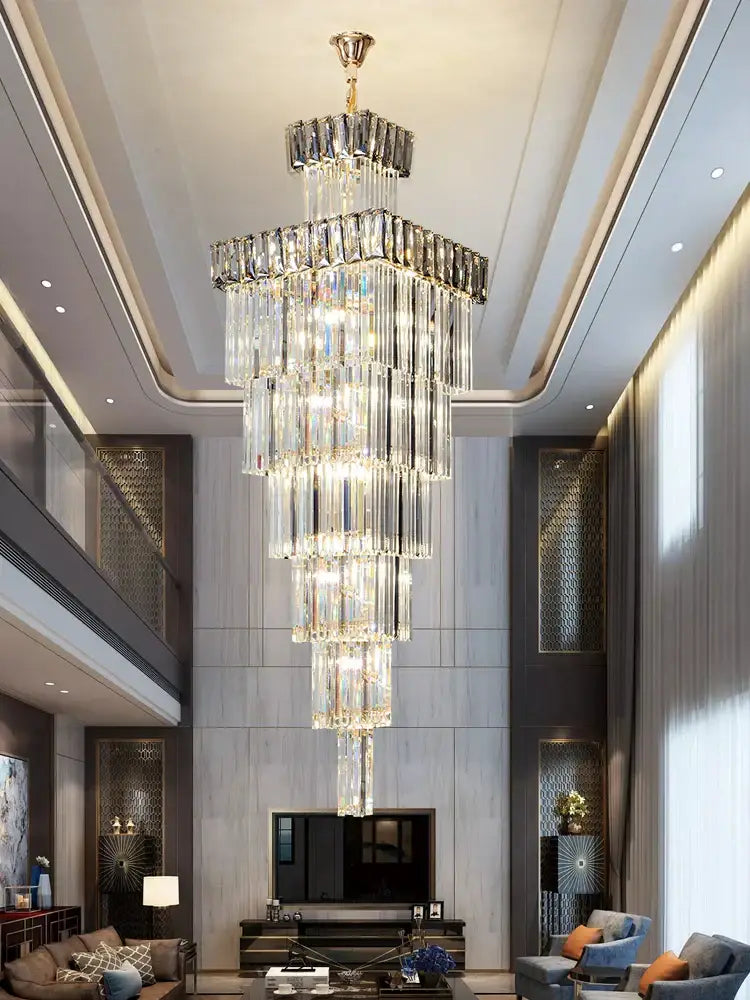 Decorbites crystal chandelier with gold-toned top and clear glass prisms for luxury spiral staircase pendant light
