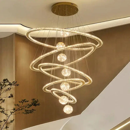 Golden spiral decorbites crystal chandelier with crystal-encrusted rings and spherical lights for indoor living room lighting
