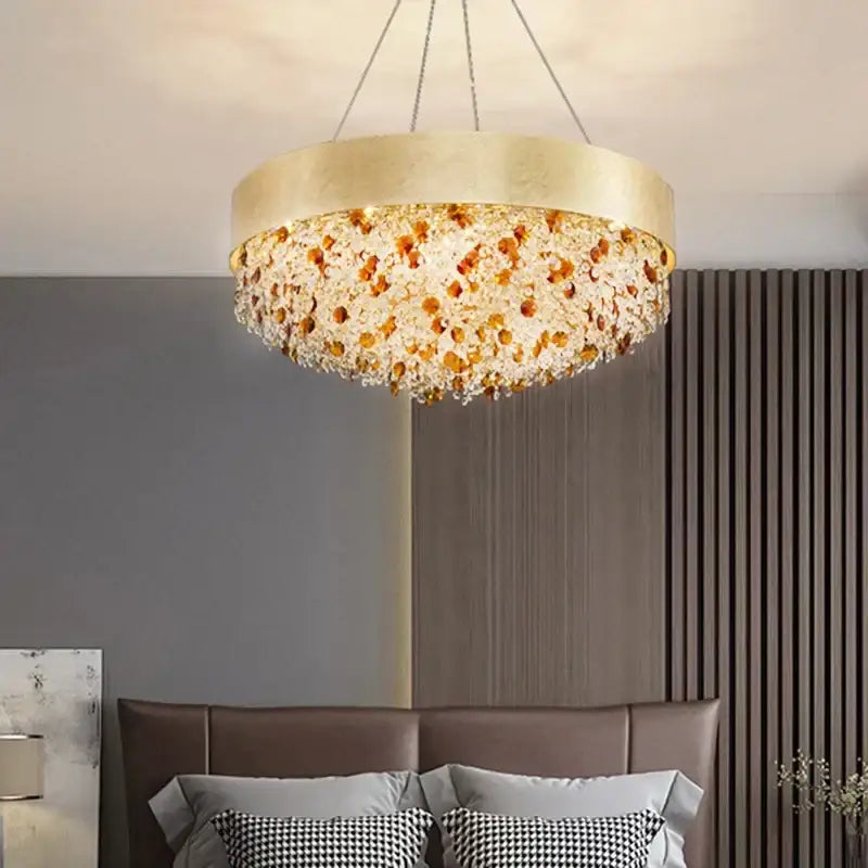 Gold-toned decorbites crystal chandelier with cascading amber and clear crystal beads for living room or kitchen island