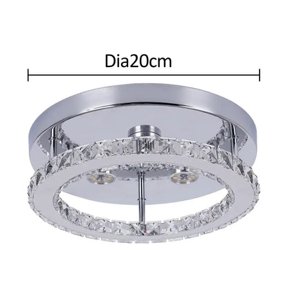 Chrome-finished decorbites crystal chandelier with double-ring design, faceted crystals, and dimmable LED bulbs for living rooms