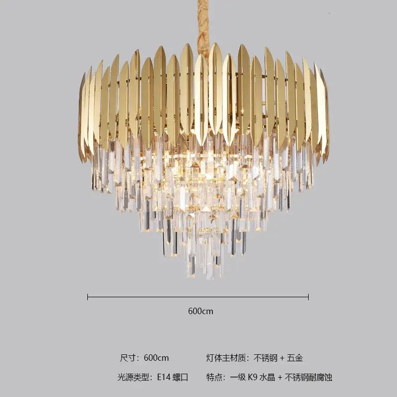 Gold-toned decorbites crystal chandelier with vertical metallic blades and clear prisms for modern dining rooms and villas