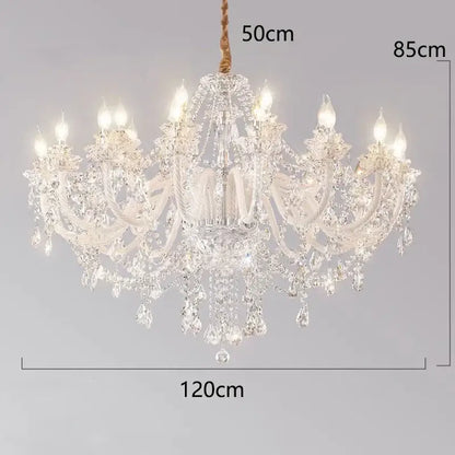 Decorbites crystal chandelier with intricate arms and teardrop crystals featuring a white fabric accent for living room lighting