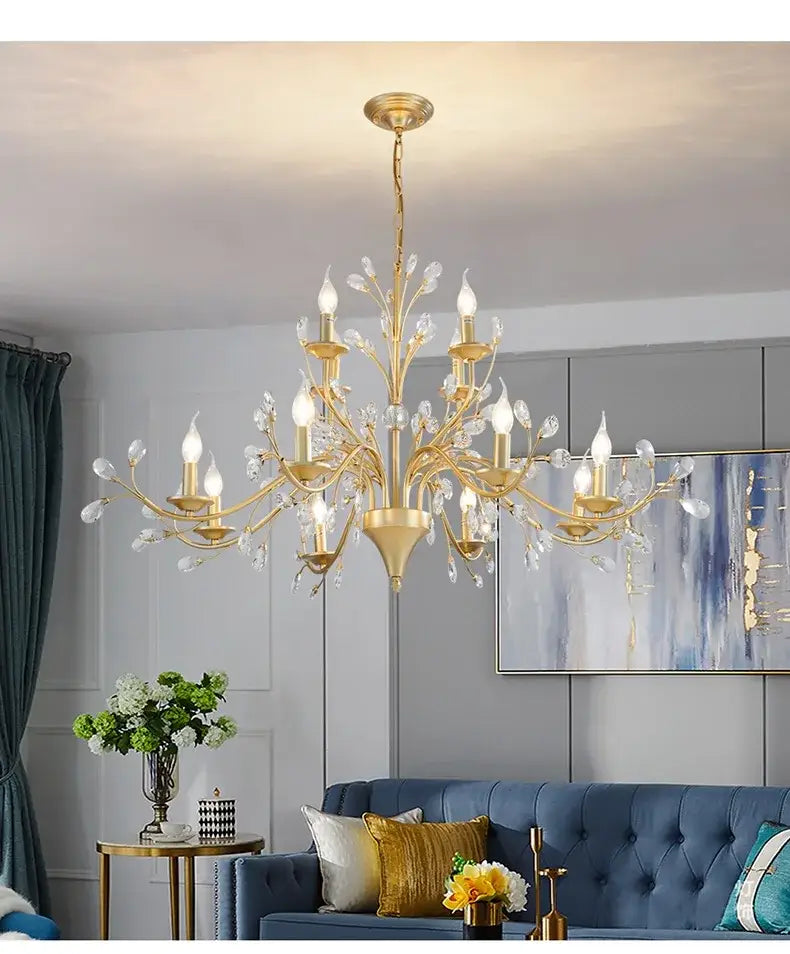 Gold-toned decorbites crystal chandelier with crystal accents and candle-style bulbs for modern vintage lighting