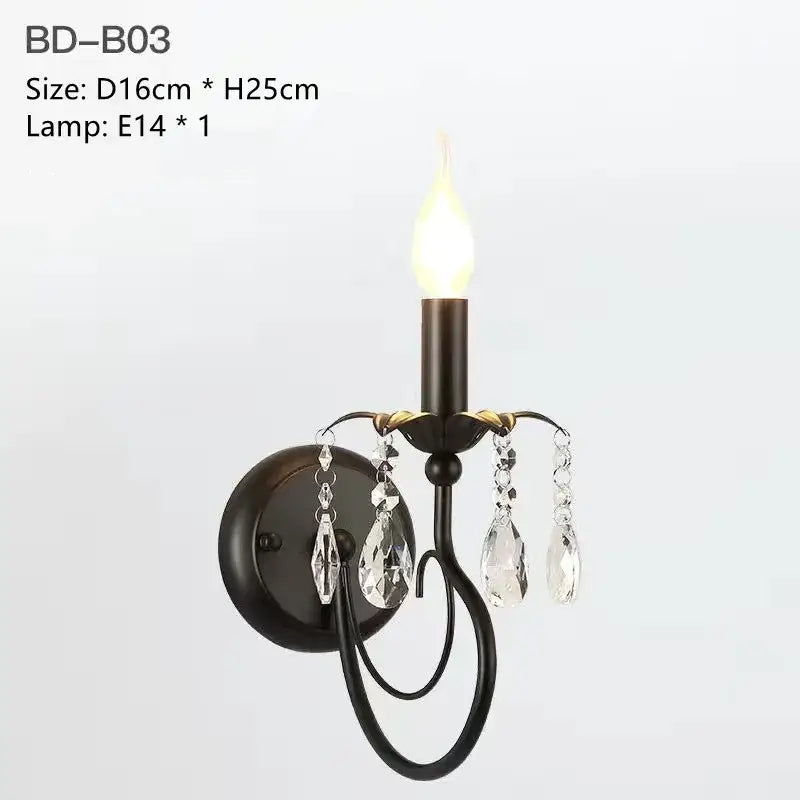 Black wrought iron wall sconce with dangling crystal teardrop pendants and candle bulb by decorbites crystal chandelier