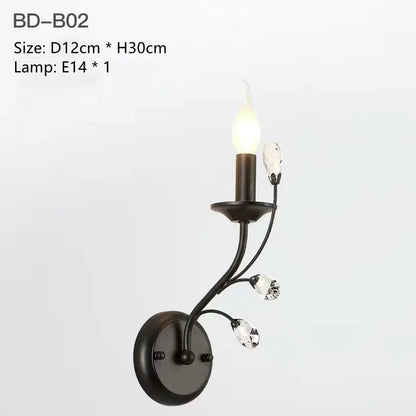 Black wrought iron wall sconce with crystal accents and e14 bulb from DecorBites crystal chandelier collection