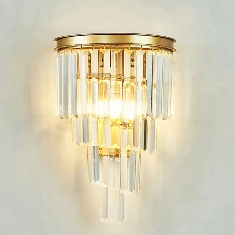 Gold-toned decorbites crystal chandelier wall sconce with cascading clear crystal prisms for elegant home decor