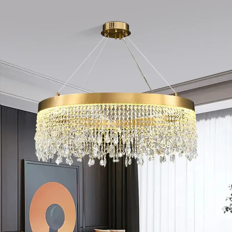 Gold-toned decorbites crystal chandelier with cascading clear crystal droplets for modern living room and kitchen lighting
