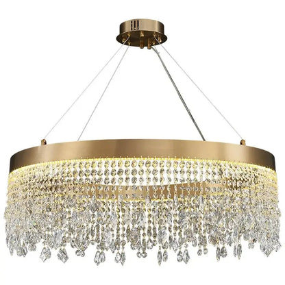 Gold-toned decorbites crystal chandelier with cascading clear crystal droplets and sleek metallic frame for modern rooms