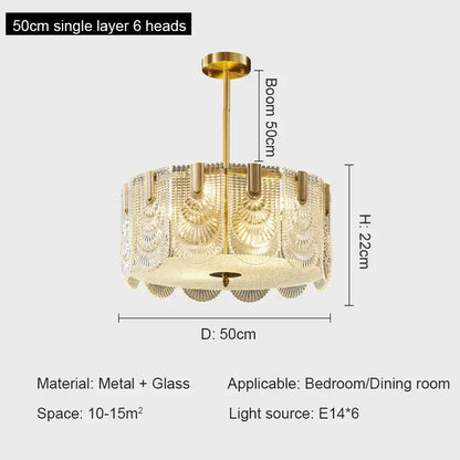 Gold-toned decorbites crystal chandelier with six glass fan-shaped heads and metallic frame for modern luxury spaces