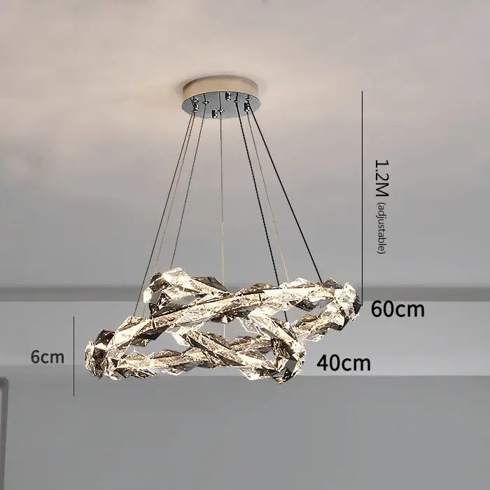 Modern chrome-finished decorbites crystal chandelier with sculptural intertwined rings for luxury duplex staircase lighting