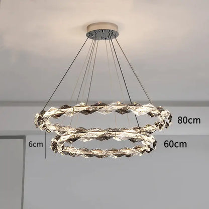 Modern decorbites crystal chandelier with faceted crystals and chrome finish, double-ring design for duplex staircases