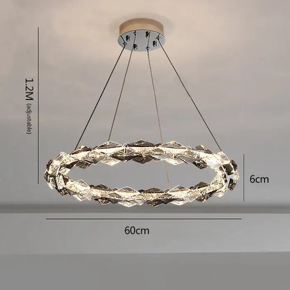 A modern decorbites crystal chandelier with faceted crystals and chrome accents for luxury duplex staircase lighting