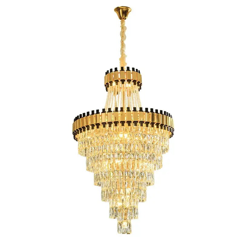 Golden decorbites crystal chandelier with cascading clear crystal prisms and polished brass accents for luxury spaces