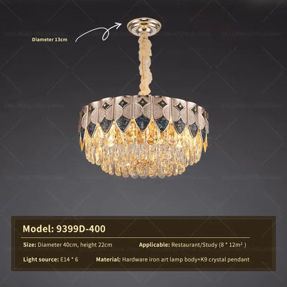 A decorbites crystal chandelier with polished brass body, dark blue and gold mosaic panels, and cascading k9 crystals
