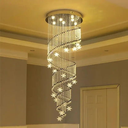 A decorbites crystal chandelier with cascading crystal strands and star accents on a sleek metallic base for modern luxury