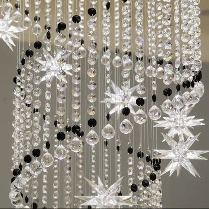 Decorbites crystal chandelier featuring sparkling black and clear crystals with star-shaped ornaments for modern luxury lighting