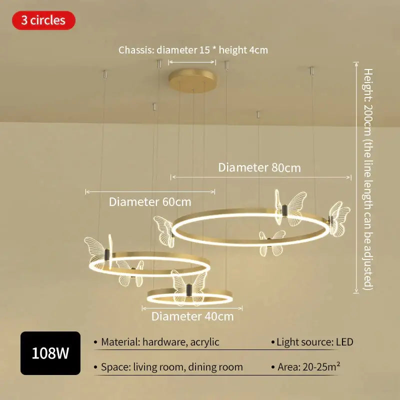 Modern gold-toned decorbites crystal chandelier with three circular rings and butterfly cutouts for luxury lighting
