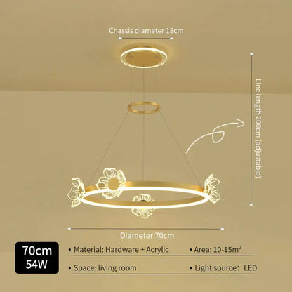 Gold-toned circular decorbites crystal chandelier with floral acrylic accents and adjustable hanging length for modern luxury lighting