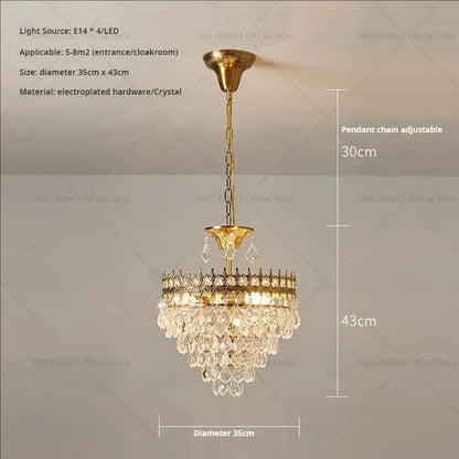 Gold-toned decorbites crystal chandelier with crystal droplets and decorative pendant chain for modern luxury lighting