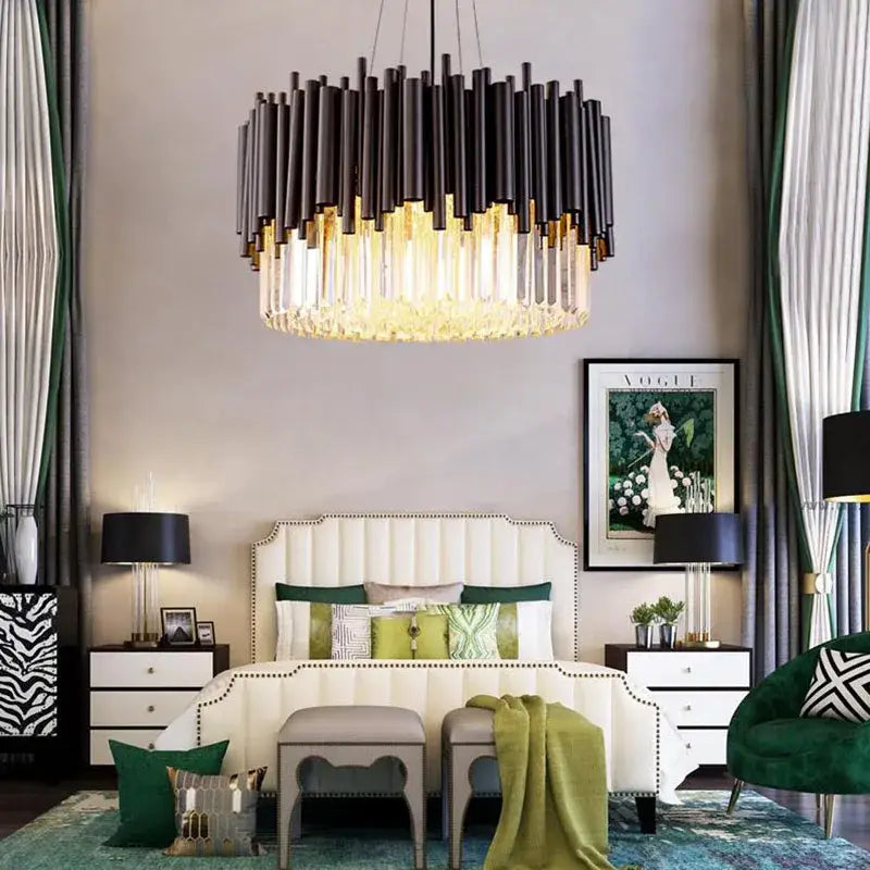 Black and gold DecorBites crystal chandelier with crystal accents hanging above bed for elegant living rooms