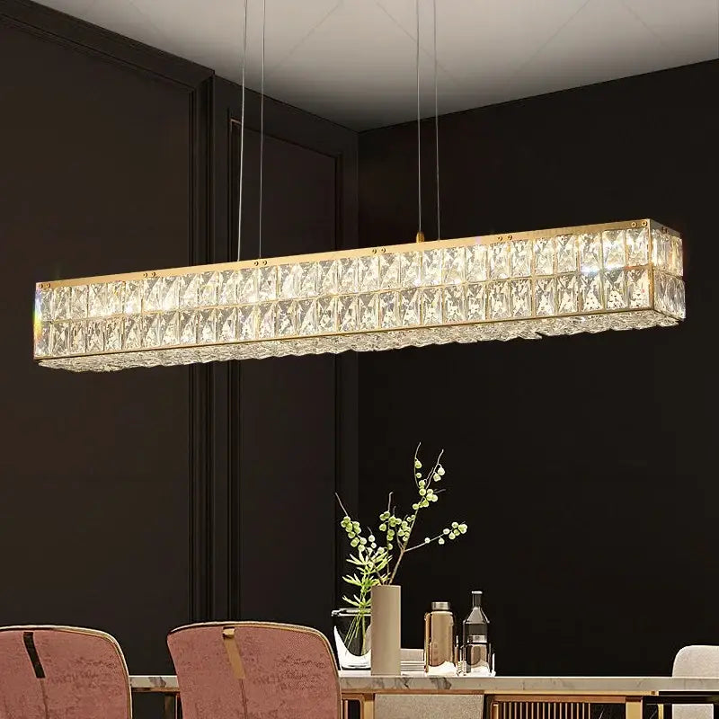Gold-toned decorbites crystal chandelier with faceted crystal panels for modern luxury living room and restaurant lighting