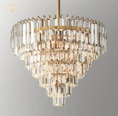 A decorbites crystal chandelier with a gold-toned frame and cascading prisms for modern dining room lighting