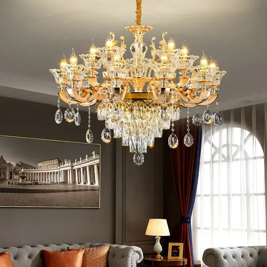 Gold-toned decorbites crystal chandelier pendant with intricate detailing and teardrop crystals for European décor