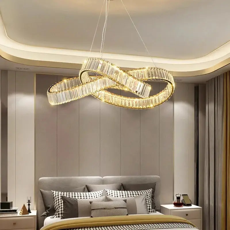 Decorbites crystal chandelier pendant lamp features clear crystal segments with warm led lighting for modern living rooms