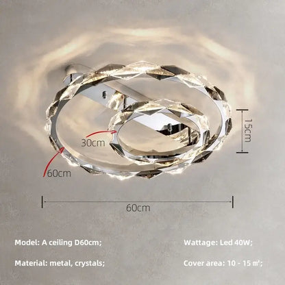 A modern decorbites crystal chandelier pendant light with interlocking crystal rings and a chrome metallic frame