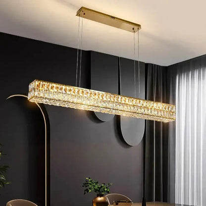 Gold-toned DecorBites crystal chandelier pendant light with embedded crystal facets for living and dining rooms