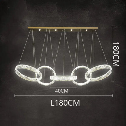 Modern DecorBites crystal chandelier pendant light with four crystal-encrusted rings and gold-toned bar for living room lighting