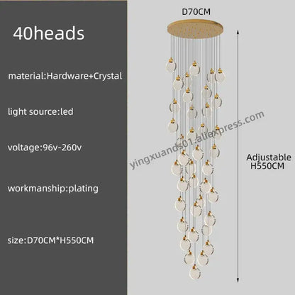 A decorbites crystal chandelier pendant light with 40 clear crystal orbs and gold hardware for luxury staircase