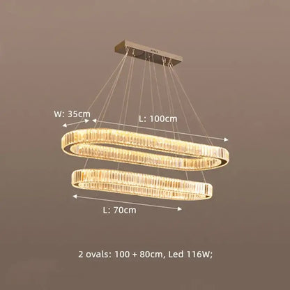 Modern double-oval decorbites crystal chandelier pendant lights with gold-toned metal frame and clear crystal accents