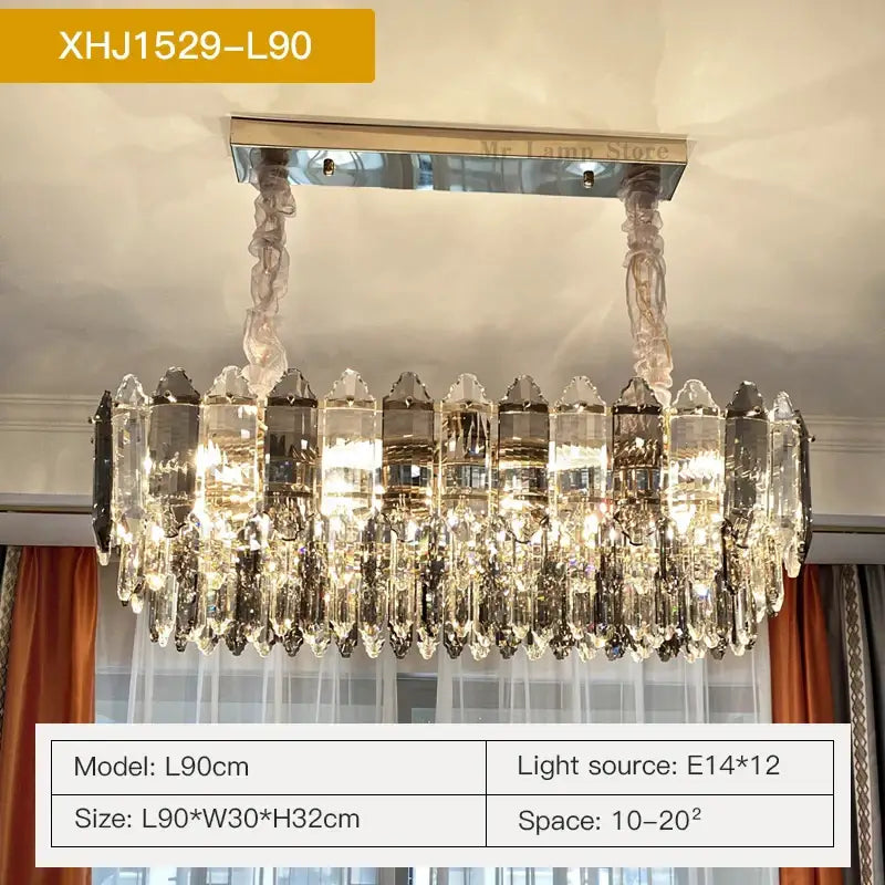 A modern decorbites crystal chandelier with clear faceted crystal prisms and polished chrome finish for luxury living rooms