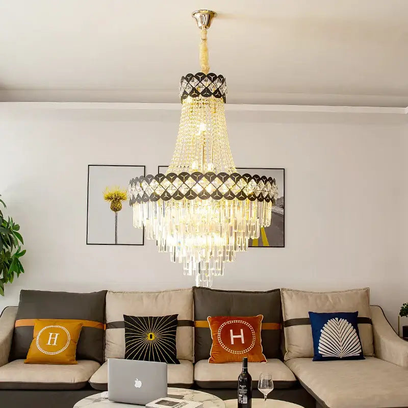 DecorBites crystal chandelier with gold metal frame clear crystal prisms and black diamond accents for spiral staircase decor
