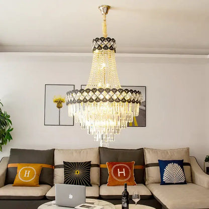 DecorBites crystal chandelier with gold metal frame clear crystal prisms and black diamond accents for spiral staircase decor