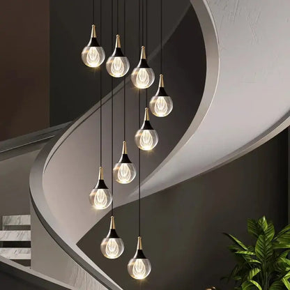 Modern glass pendant lights with gold-toned metal accents in decorbites crystal chandelier stair pendant lamp for living room lighting