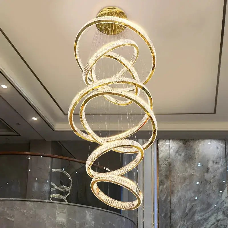 Golden spiral decorbites crystal chandelier with crystal-encrusted rings for modern luxurious living room lighting