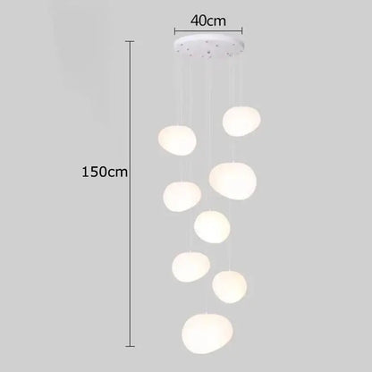 A modern white decorbites crystal chandelier pendant lamp with seven frosted glass globe lights for stair lighting