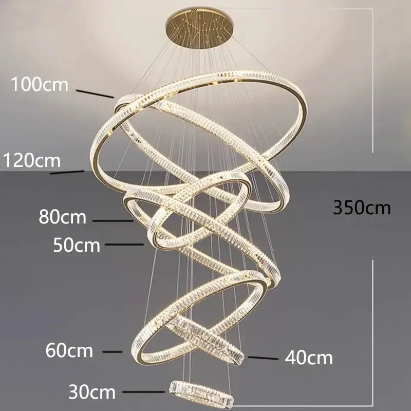 A modern decorbites crystal chandelier with interlocking gold rings and clear crystal accents for living room lighting