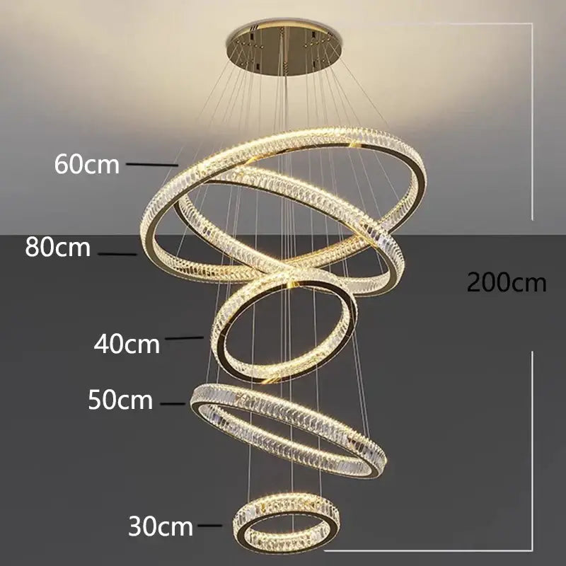 Modern decorbites crystal chandelier with interlocking rings and clear crystal elements lit by warm led lights for living room