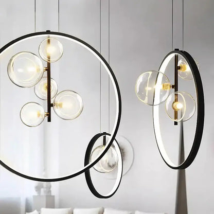 Modern black circular pendant light with clear glass globe bulbs and brass accents decorbites crystal chandelier stair lamp