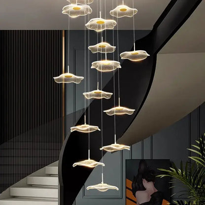 A modern DecorBites crystal chandelier stair pendant light with illuminated flower-shaped metallic wireframe fixtures