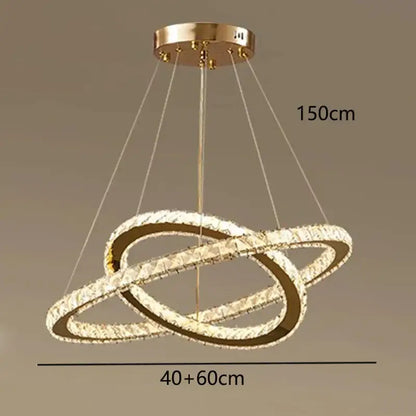 Gold-toned decorbites crystal chandelier pendant light with three interlocking crystal rings for stair lighting