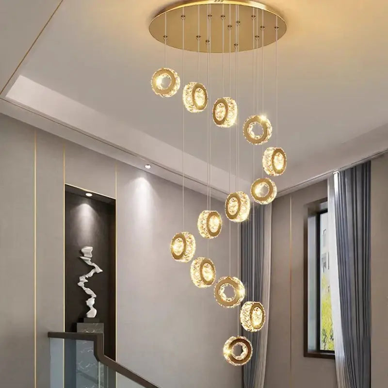 Golden circular decorbites crystal chandelier pendant light with crystal-encrusted rings for stair or living room lighting