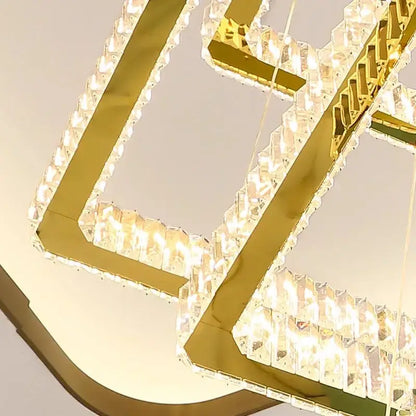 Gold-toned DecorBites crystal chandelier pendant light with faceted crystal accents for modern interior lighting