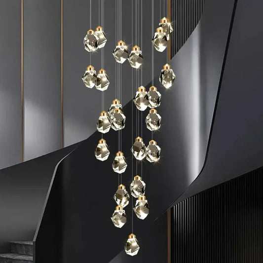 Modern decorbites crystal chandelier pendant light with faceted crystal pendants and gold-toned fixtures for living room