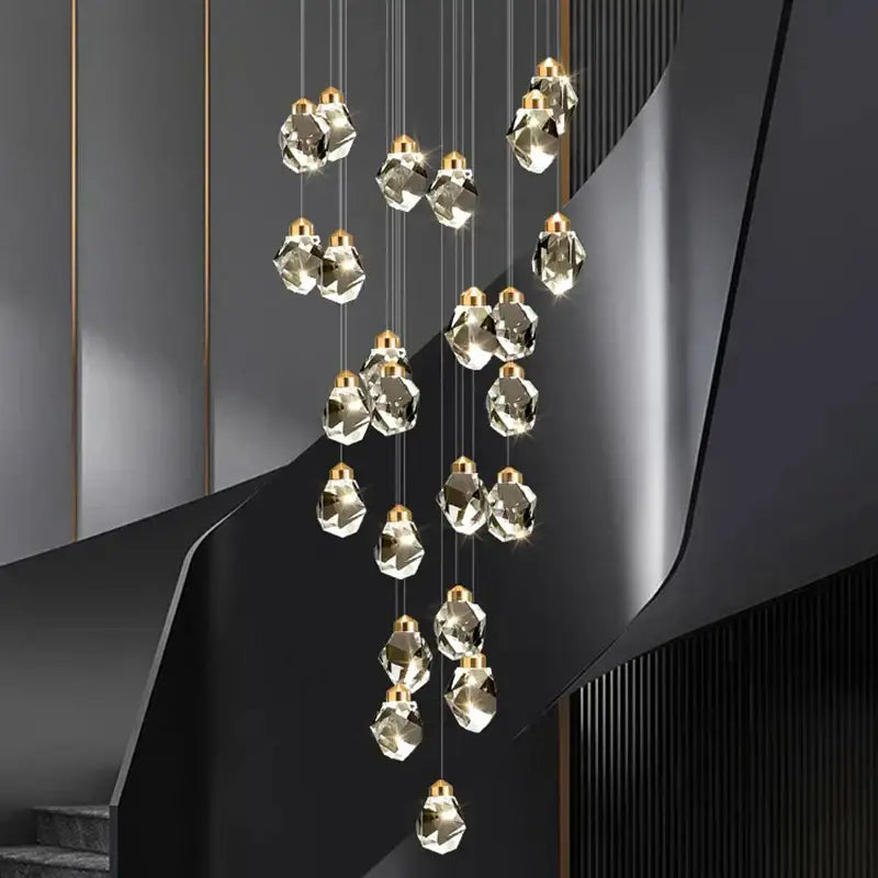 Modern decorbites crystal chandelier pendant light with faceted crystal pendants and gold-toned fixtures for living room