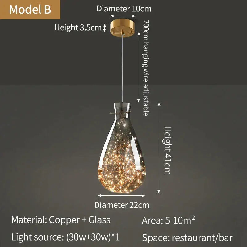 A teardrop glass pendant light with copper finish and warm fairy lights in decorbites crystal chandelier for kitchen decor