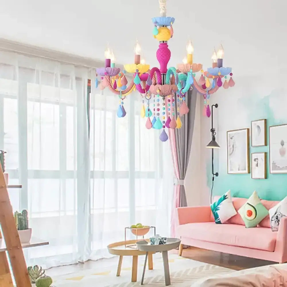 DecorBites™ multi-color kids chandelier with a pink central body and pastel crystal teardrop ornaments for kindergarten use